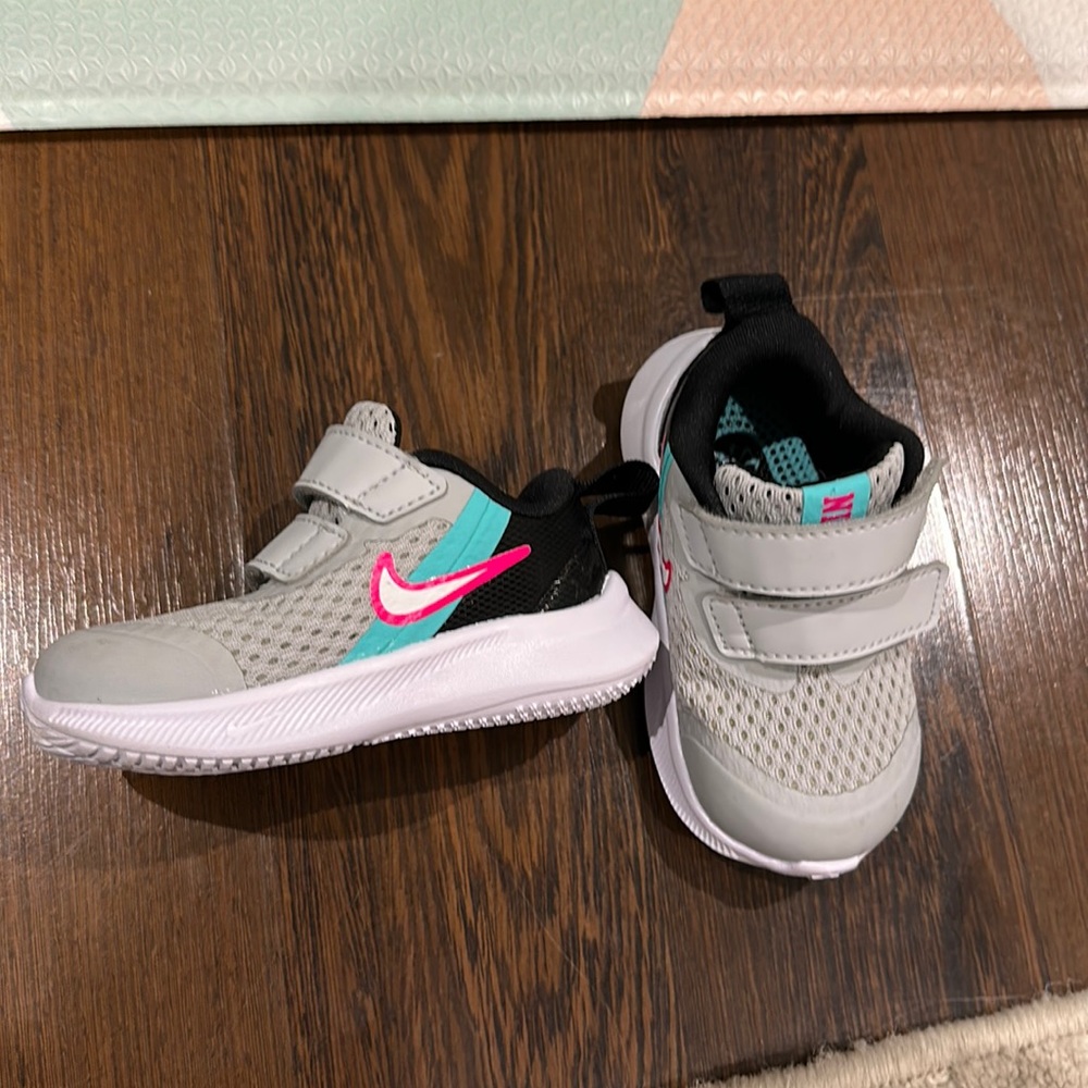 Barely worn Nike sneakers baby 4C